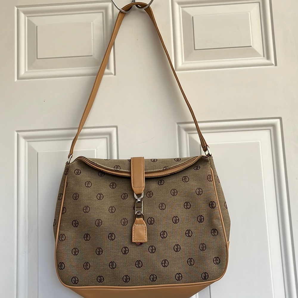 Giani Bernini Tan Cloth and Flap Shoulder Handbag with Silver Snap Closure.